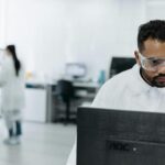 A-scientist-working-diligently-at-a-computer-in-a-modern-laboratory.-2025-06-08T060356.367-0400-pexels-photo-8442379