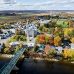 Stunning-aerial-view-of-Saint-Casimir-Quebec-featuring-fall-foliage-and-a-scenic-bridge.-2025-06-12T060402.895-0400-pexels-photo-29578741