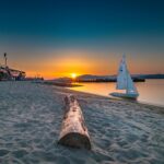 Tranquil-Vancouver-sunset-with-sailboat-beach-and-mountains-in-the-background.-2025-06-12T153638.000-0400-pexels-photo-3222187