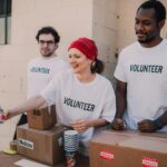 Volunteers-distributing-aid-at-an-outdoor-donation-center-promoting-social-impact-and-diversity.-2025-06-20T101208.794-0400-pexels-photo-6646918