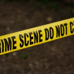 Close-up-of-crime-scene-tape-with-Do-Not-Cross-text-outdoors-setting.-2025-10-01T153806.921-0400-pexels-photo-923681